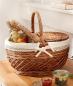 Preview: Picknickkorb aus Weide mit Klappdeckel und Textileinsatz mit Häkelborte, gefüllt mit Brot, Wein und Obst