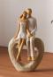 Preview: Dekofigur "Liebespaar" aus Polyresin, 22 cm hoch, Pärchen sitzend auf Herz, Skulptur, Dekoherz